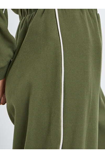 Styli Women Green Plain Relaxed Fit Joggers with Piping Detail