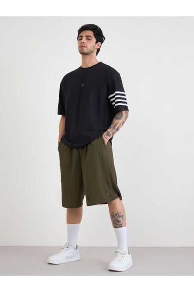 Styli Micro Pique Knit Reflective Logo Oversized Training Shorts
