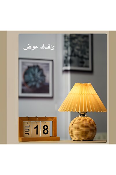 Angola Panda A foldable table lamp with a bamboo and metal base, fitted with a standard UK E27 bulb socket.