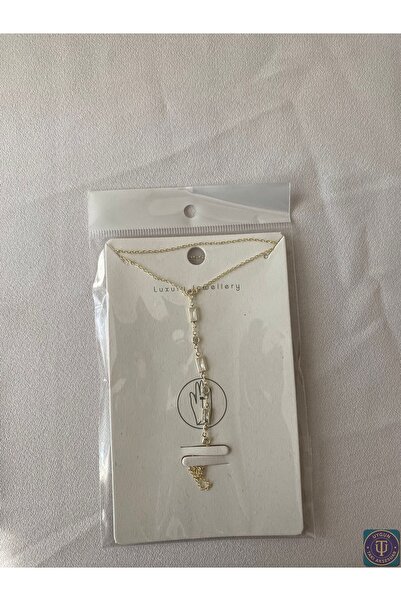 uyguntakıaksesuar حجر الباجيت ذهبي اللون شاهميران – موديل أنيق لسوار الإصبع