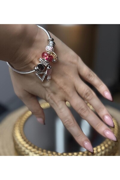 Artepieza co. سوار فضي اللون مع حلية على شكل سمكة وسوار فولاذي وردي - طقم سوا...