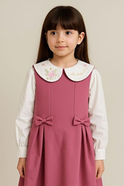 La reina petite Pink school uniform set, two pieces: pink uniform with bows and a white embroidered shirt.
