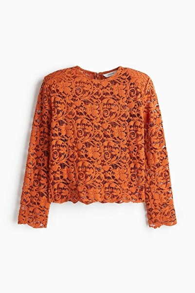 H&M بلوزة دانتيل مع وسادة كتف