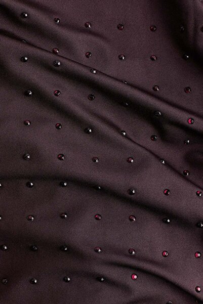 H&M بنطلون جيرسي مزين بأحجار الراين