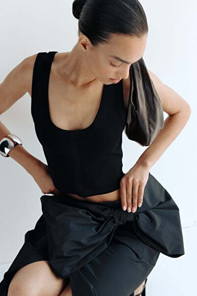 H&M تنورة ملفوفة بتفاصيل فيونكة