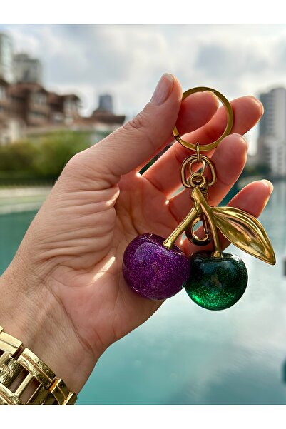 EbruVogue حقيبة تشارم مزينة بالكرز باللونين الأخضر والأرجواني مع لمسة معدنية ...