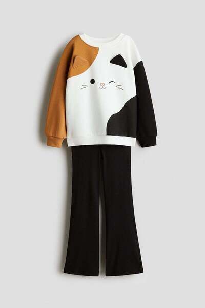 H&M طقم مكون من قطعتين من سويت شيرت وبنطال ضيق