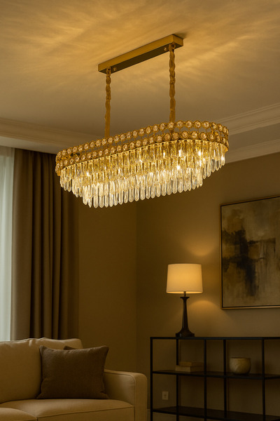 qwell A rectangular, gold-plated chandelier studded with crystals, suitable for living rooms.