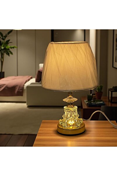 Gharaib Al Tuhaf Classic table lamp with a gold glass base