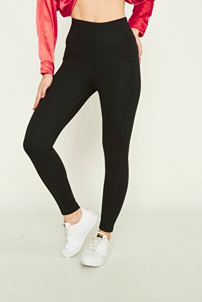 SEDA FİDAN BOUTIQUE بنطلون ضيق بتفاصيل جيوب وحزام كورسيه باللون الأسود