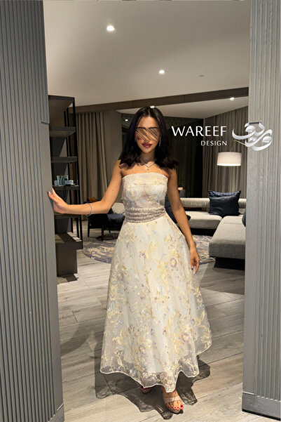 WAREEF FASHION Beige Mikado sleeveless evening dress with sparkling sequins, A-line design