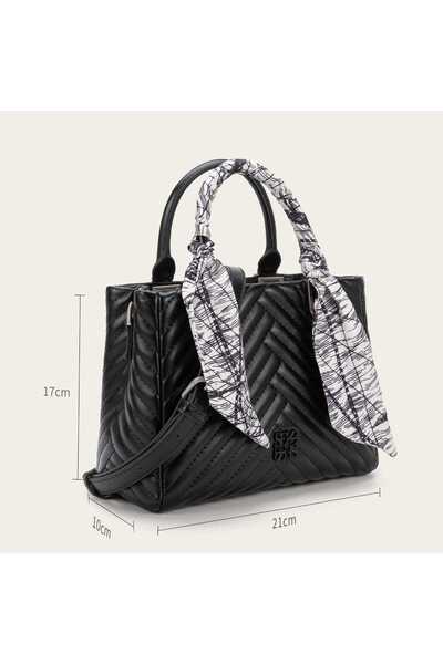 Prestige Elegant women's handbag with a distinctive scarf on the handle and a keychain