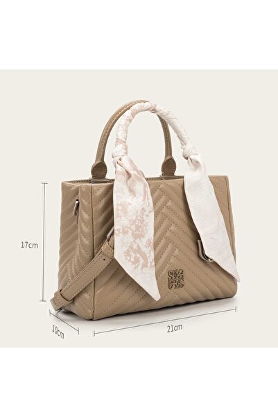 Prestige Elegant women's handbag with a distinctive scarf on the handle and a keychain