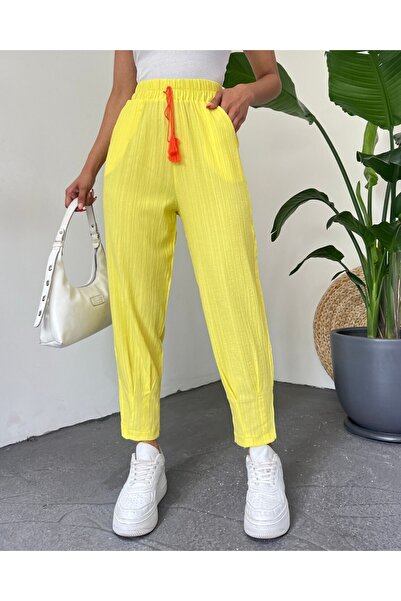 Modamorfo Trousers with dart stitched hem and lace detail