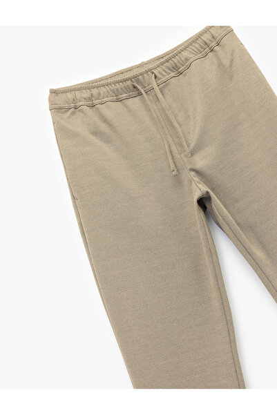 Koton Straight Fit Pike Fabric Pocket Detailed Relaxed Cut Waist Lace up Trousers