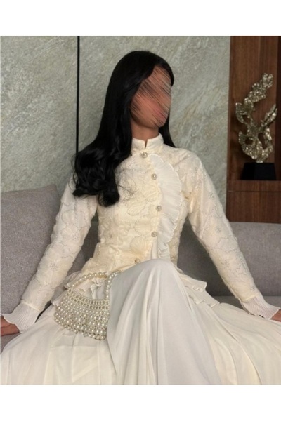 Haifa Fashion A two-piece evening dress with luxurious royal touches