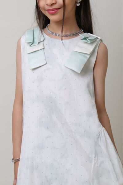 Generic Girls' dress with small glittery polka dots and viconte-shaped shoulder straps