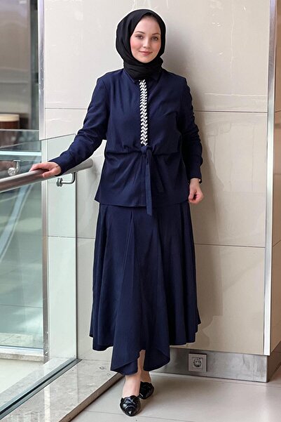 Ghisa Nubuck Shirt Skirt Set with Stone Embellished Tie Model on the Front