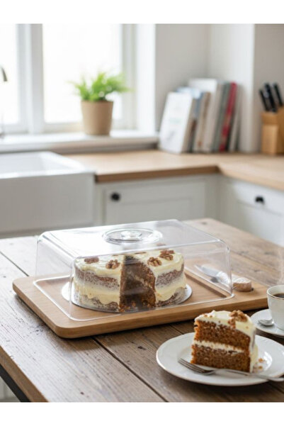 Generic A luxurious wooden cake stand with a clear acrylic lid and a small carving knife – elegance and quality in presentation