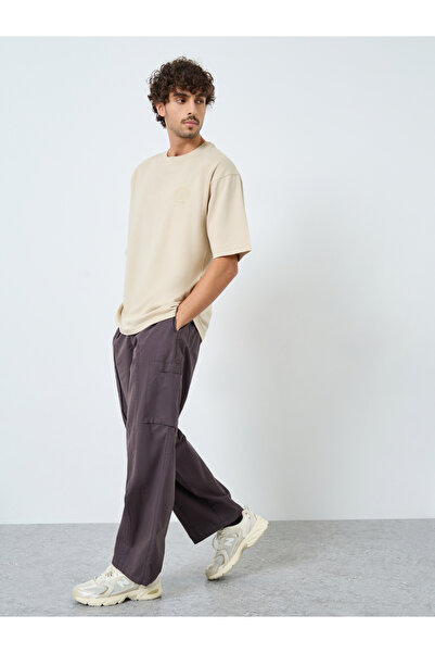 Styli Beige Graphic Print Oversized T-Shirt