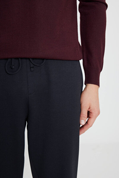 AC&Co / Altınyıldız Classics Men's Black Cotton Standard Fit Regular Cut Elastic Waist Diagonal Pattern Knitted Trousers