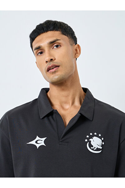 Styli Black Graphic Print Oversized Polo Shirt