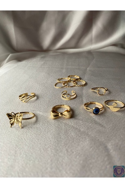 uyguntakıaksesuar Altın Renk 12’li Çelik Yüzük Seti – Kelebek, Nazar Boncuğu & Minimal Tasarımlar