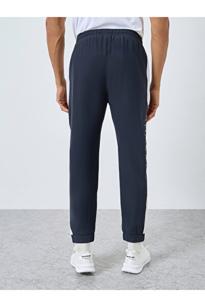 Styli Regular Fit Joggers with Side Panel and Print Detail