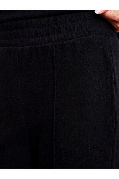 Dilvin 71927 Elastic Waistband Stitching Detail Loose Sweatpants-Black
