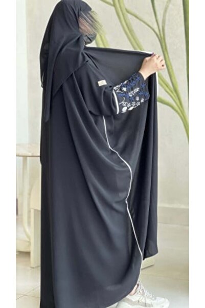 GENERIC4 We offer a jewel-colored bisht with elegant embroidery.