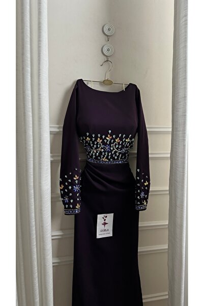 Onila Luxurious purple dress with embroidery on the abdomen and sleeves