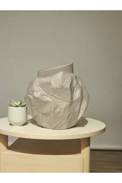 bity thok Modern rock-inspired ceramic vase in a matte ivory color