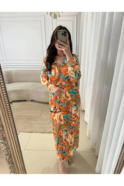 Elegent A soft wrap dress in orange and green – a stylish design for everyday occasions