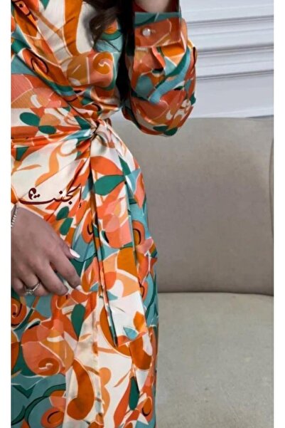 Elegent A soft wrap dress in orange and green – a stylish design for everyday occasions