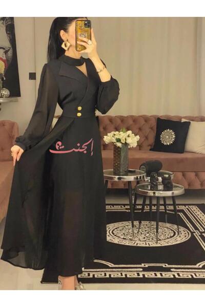 Elegent A sleek black dress with gold buttons and a classic cut - a luxurious design with a sophisticated touch.