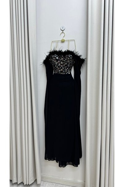 MASHN The black evening dress: a unique, regal design embroidered with feathers, combining luxury and mystery for a captivating look.