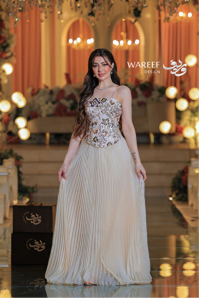 MAC CENTER Beige evening dress decorated with beads and roses