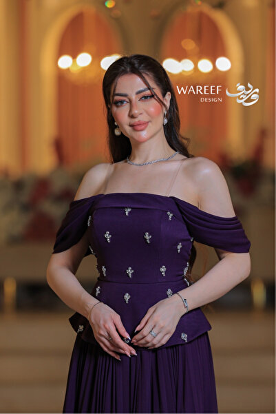 MAC CENTER A purple, embellished, and shimmering evening dress