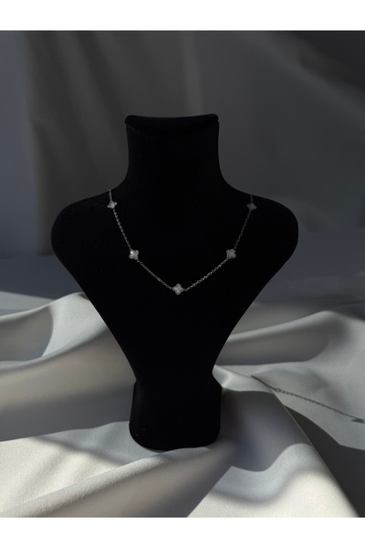 NB STEELORA قلادة فضية صغيرة بأربع أوراق من الفولاذ الأبيض