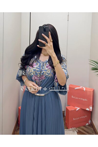 Elegent Sky blue dress embroidered with shimmering flowers and elegant pleated details - one size fits all