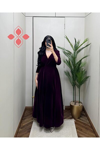 Elegent Long purple velvet dress with an elegant wrap design