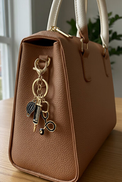 Modex Μπρελόκ αξεσουάρ τσάντας με χρυσό κίτρινο στηθοσκόπιο