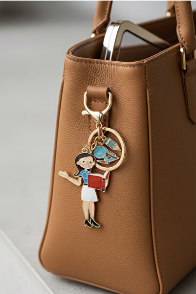 Modex Golden Yellow Teacher Reading a Book Bag Accessory Keychain