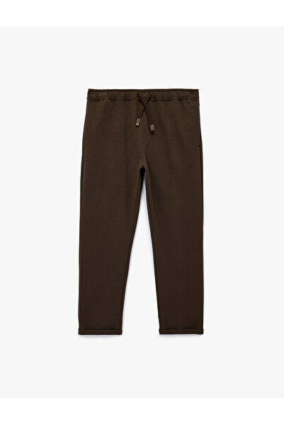 Koton Pocket Detailed Folded Leg Relaxed Cut Waist Lace up Trousers