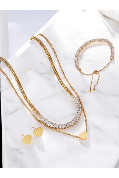 NEW STYLE A sophisticated and distinctive accessory set: a necklace measuring 45 + 5 cm and a bracelet of a single size, presented in a suitable gift box.