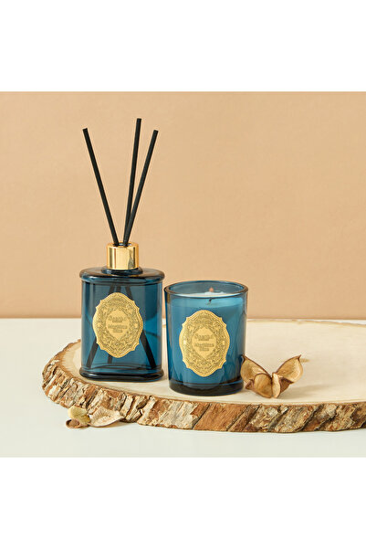Scent.d London مجموعة هدايا من قطعتين من الشموع المعطرة برائحة البحر والعود ا...