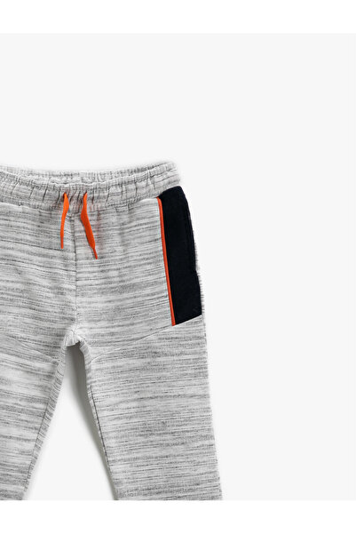 Koton Jogger tepláky s kravatou v pase