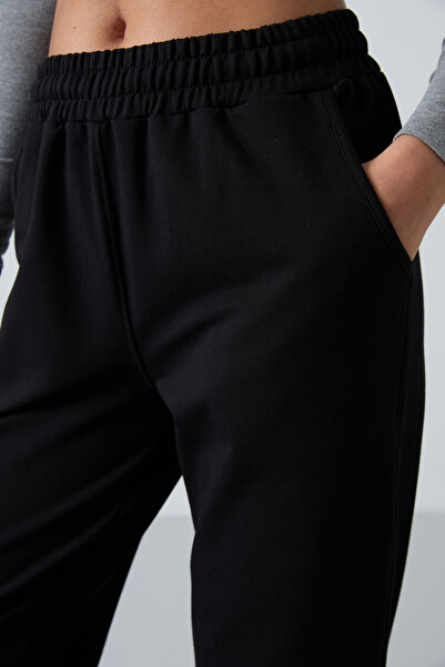 TOMMY LIFE Μαύρες τσέπες ψηλόμεσο άνετο γυναικείο πάτο φόρμας από καουτσούκ - 94583