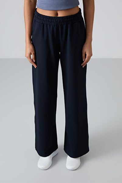 TOMMY LIFE Γυναικεία αθλητική φόρμα με φαρδιά φόρμα Navy Blue με ψηλόμεσο πάτο - 94567