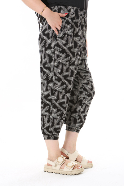 Şans Чорні віскозні штани великого розміру - крій шаровари, з еластаном 65N38141